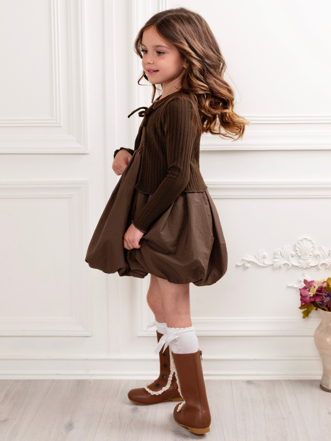 Girls bubble hem fall dress with ribbed knit cardigan.