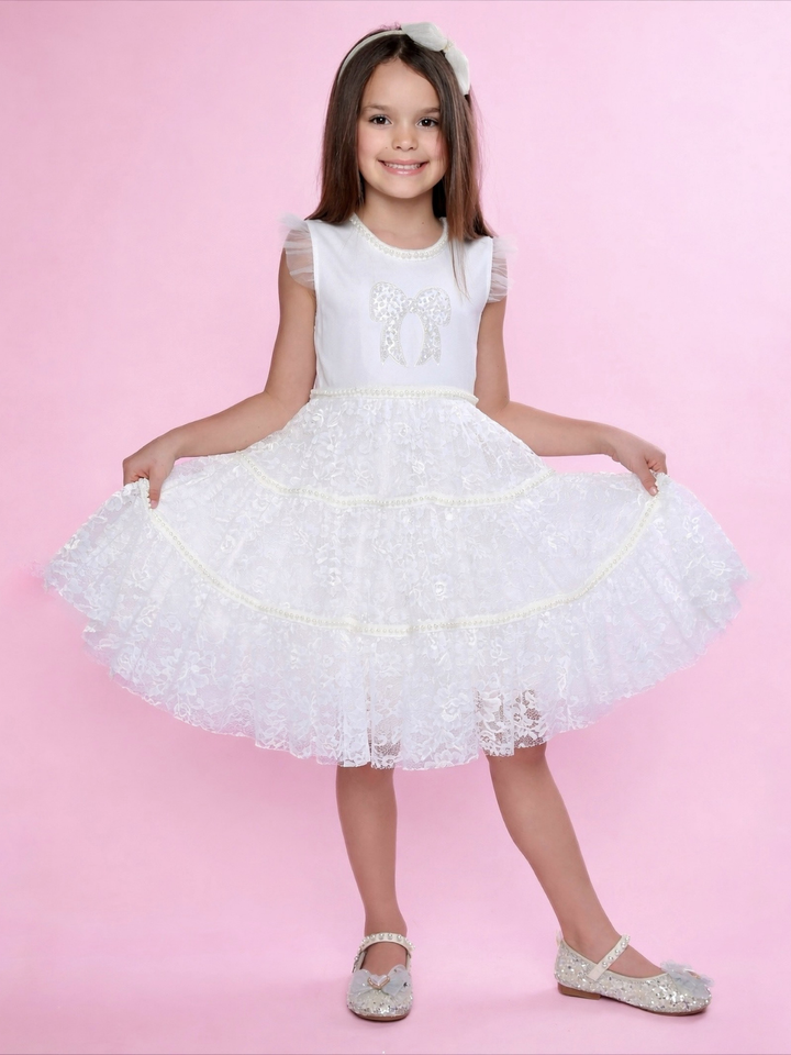 Ivory girls dress styled for weddings, parties, and special occasions