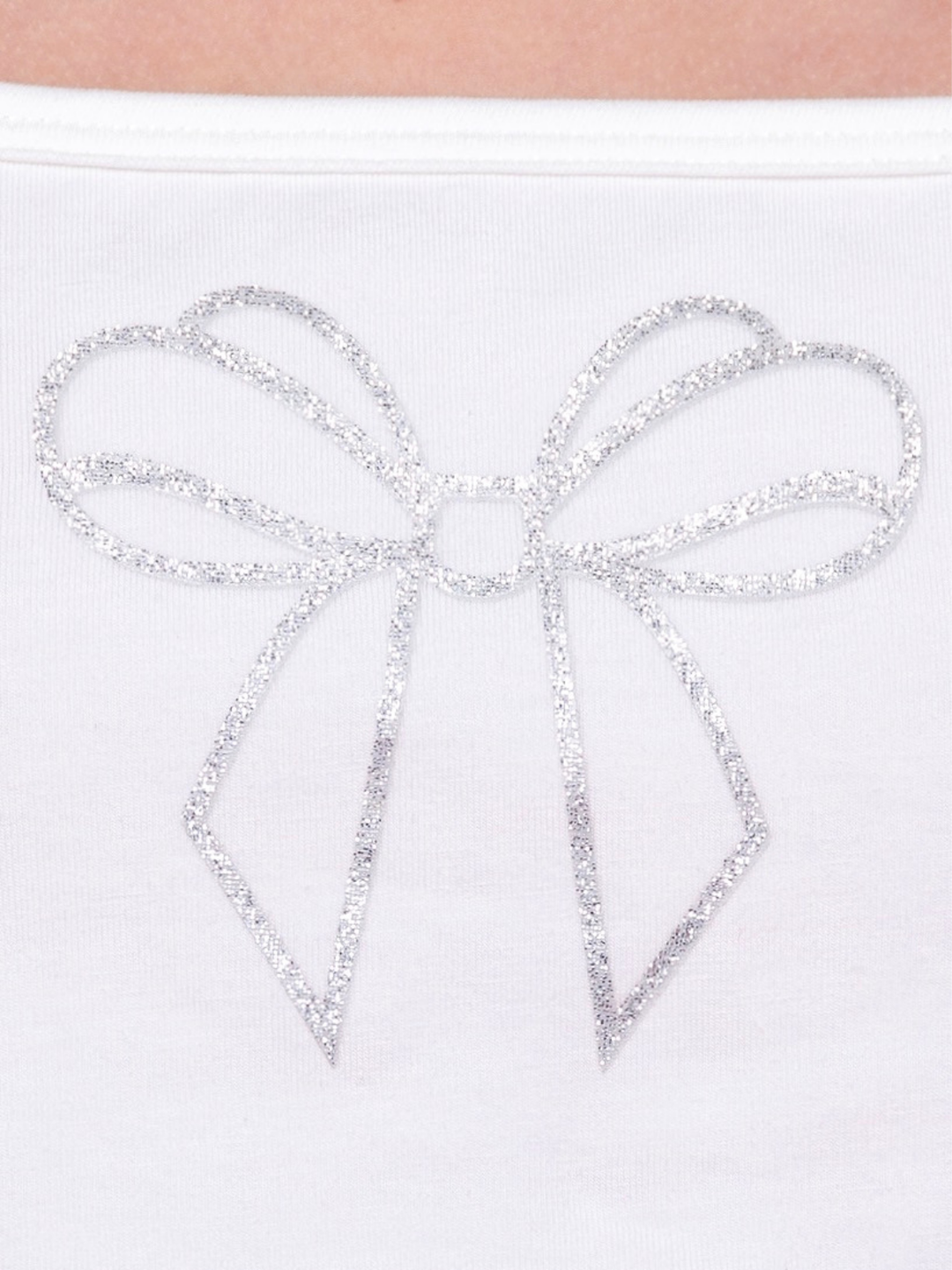 Detail of bow graphic on girls sleeveless top