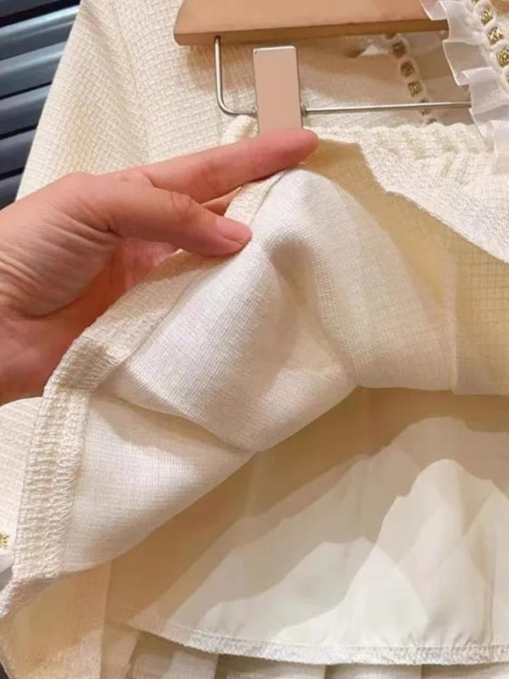 Elegant Pearl Button Jacket & Pleated Skirt Set