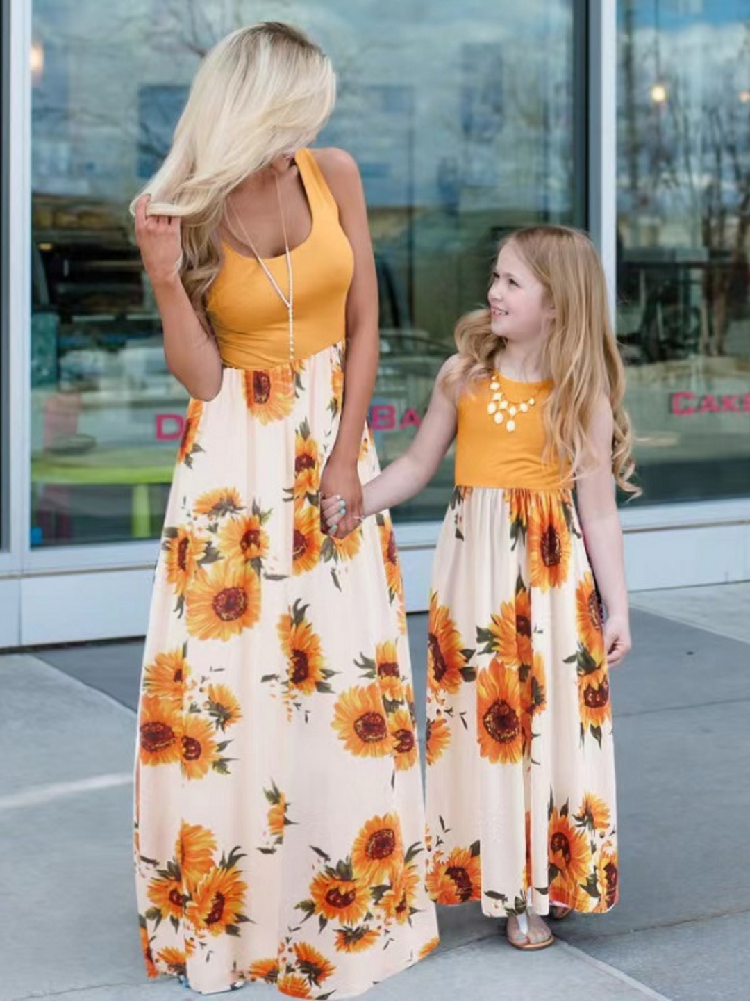 sunflower maxi dress Gazing Floral its shirred waist and cuffs create a flattering Mommy and Me Sweet Sunflower