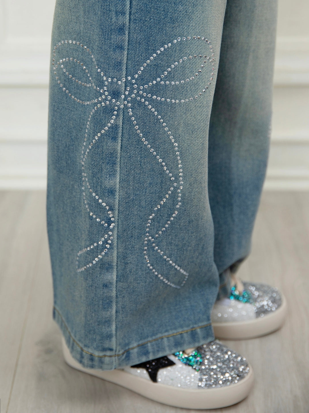 Trendy girls wide leg jeans featuring sparkling crystal bows