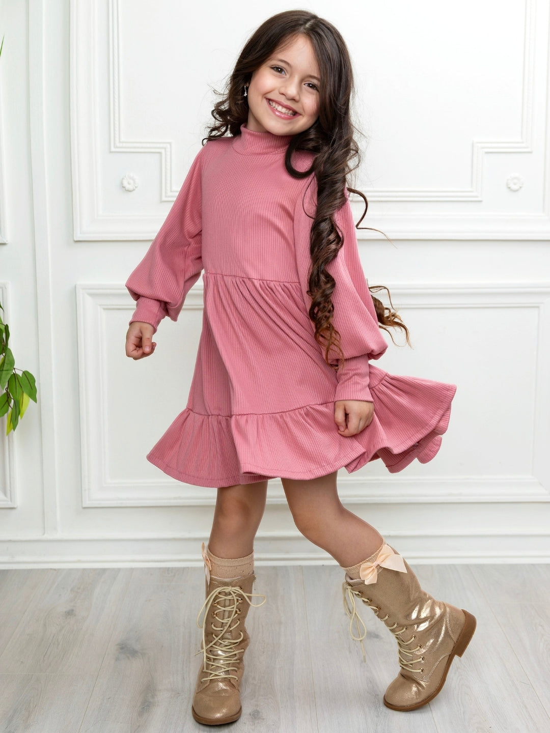 Girls pink ribbed dress with ruffle hem and long sleeves