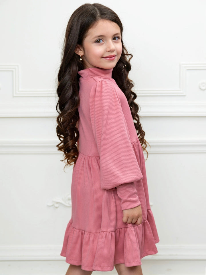 Pink girls dress featuring soft ribbed knit fabric