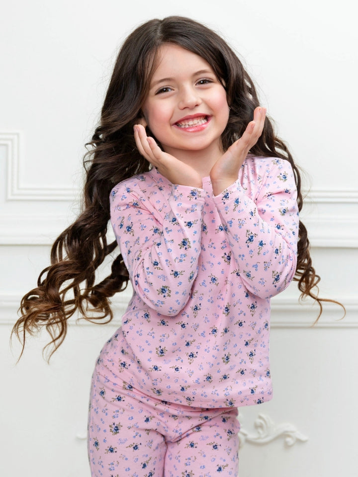 Girls floral two piece outfit featuring pink flower print
