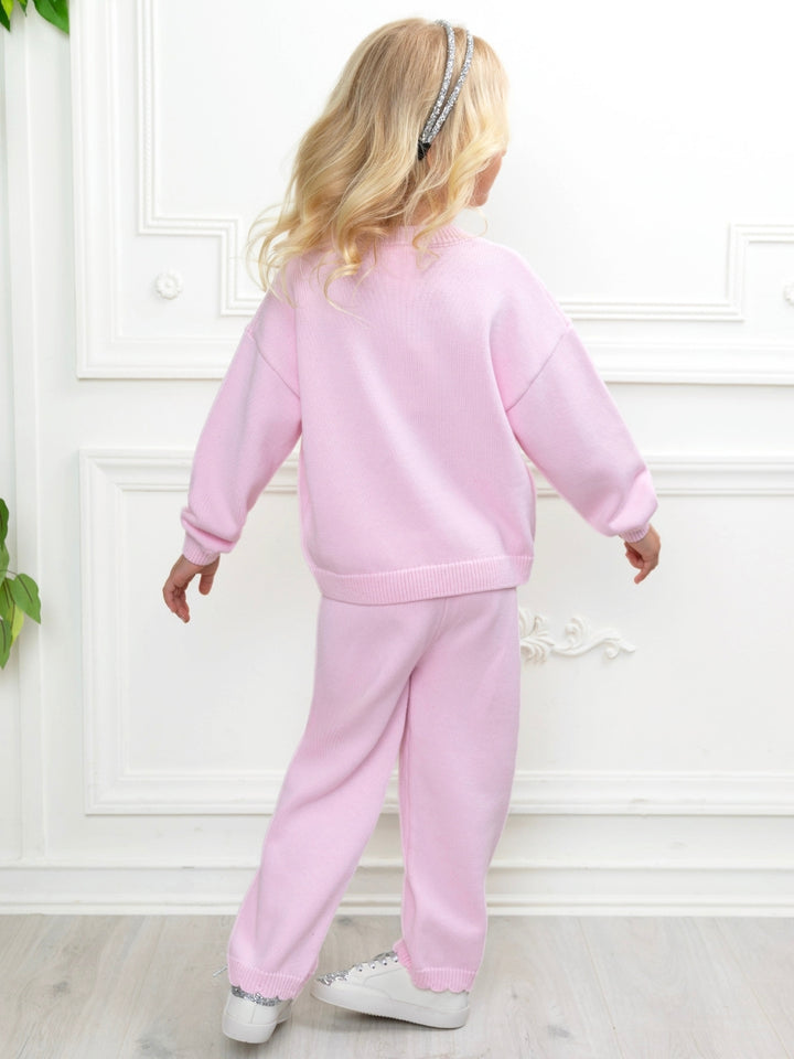 Stylish girls pink sweater set with ribbed knit texture