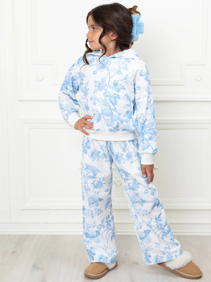 Girls school outfit featuring blue floral print and hoodie