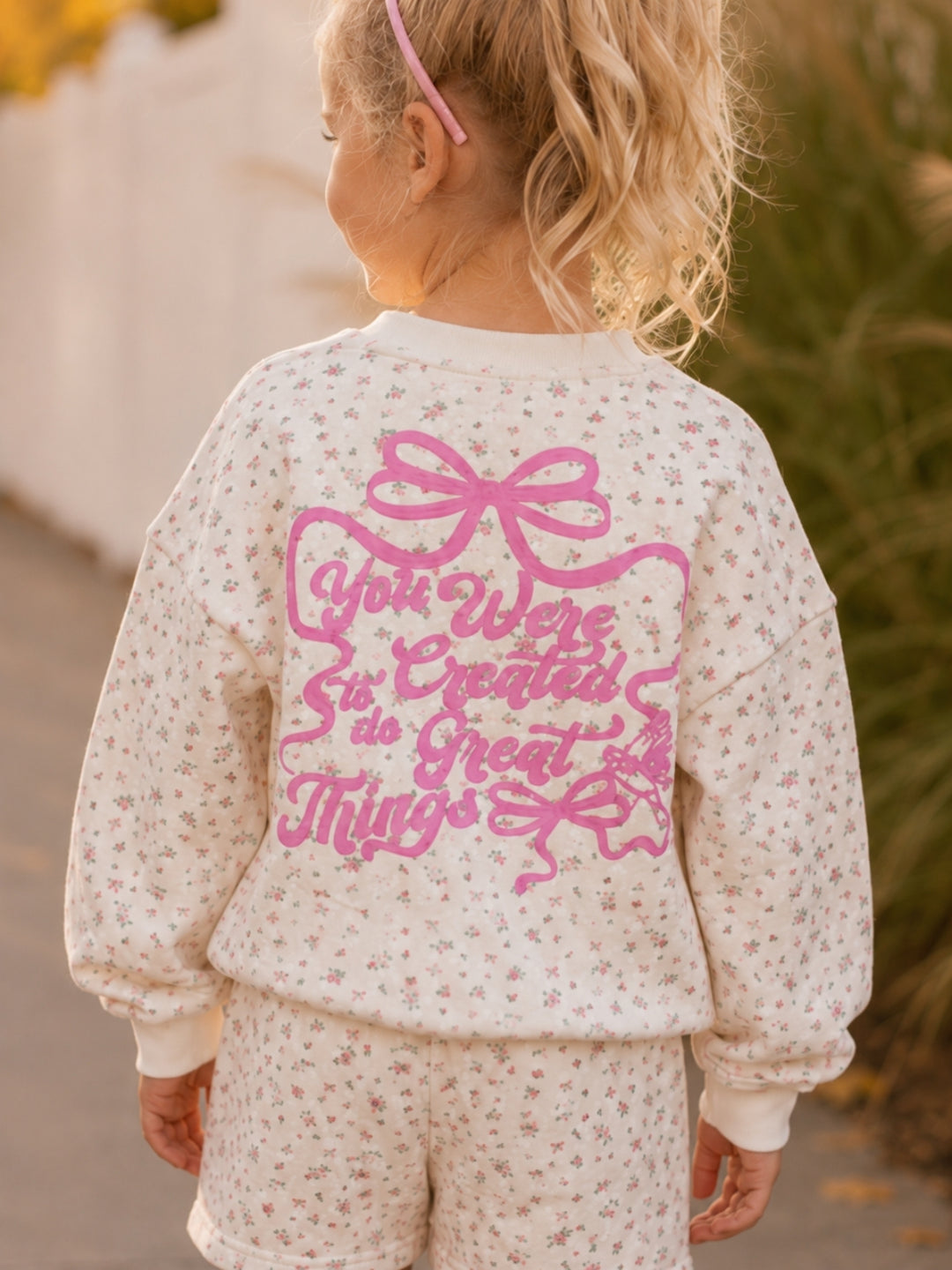 Girls casual lounge set with motivational back graphic.