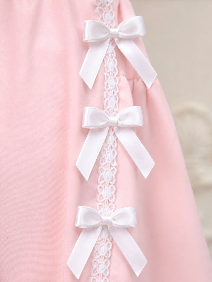 Girls matching skirt set featuring lace ribbon bow accents