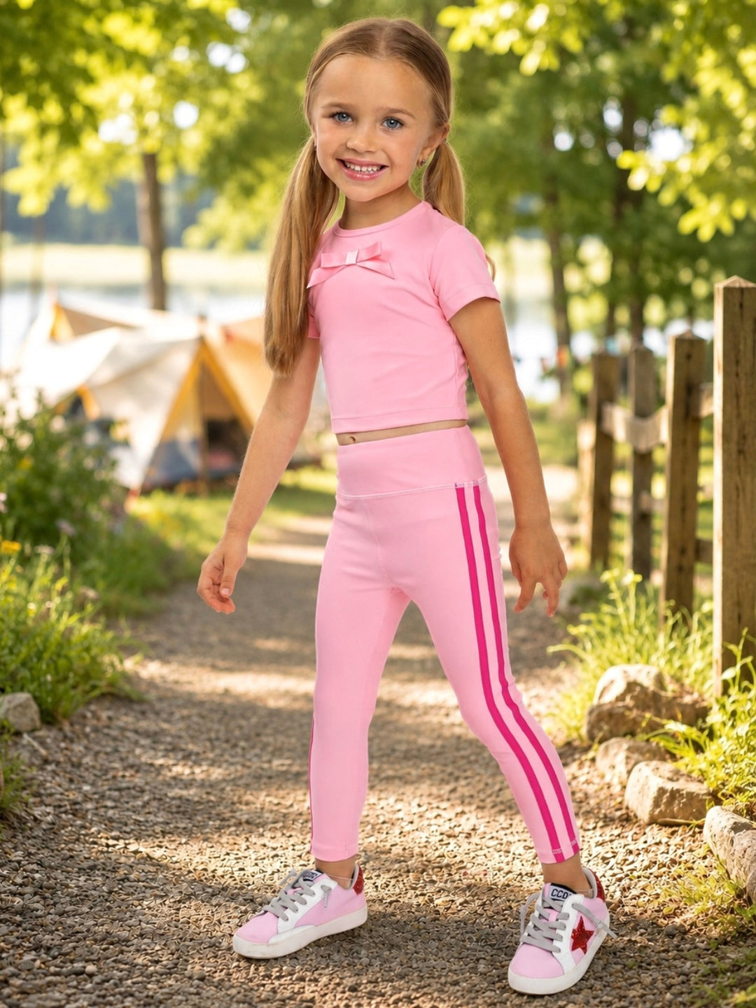 Girls pink bow activewear set with crop top and leggings