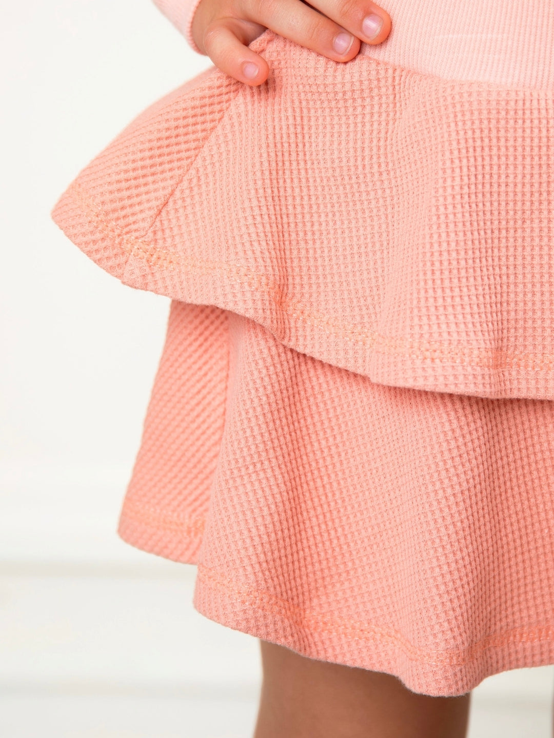 Cute girls waffle knit outfit with tiered ruffle skort