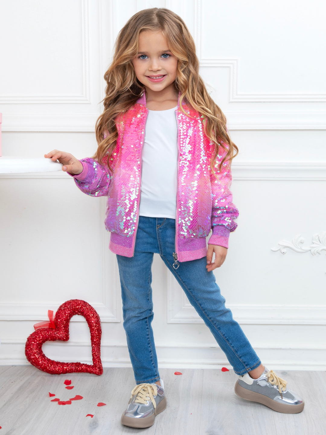 Girls glitter pink sequin jacket styled with jeans