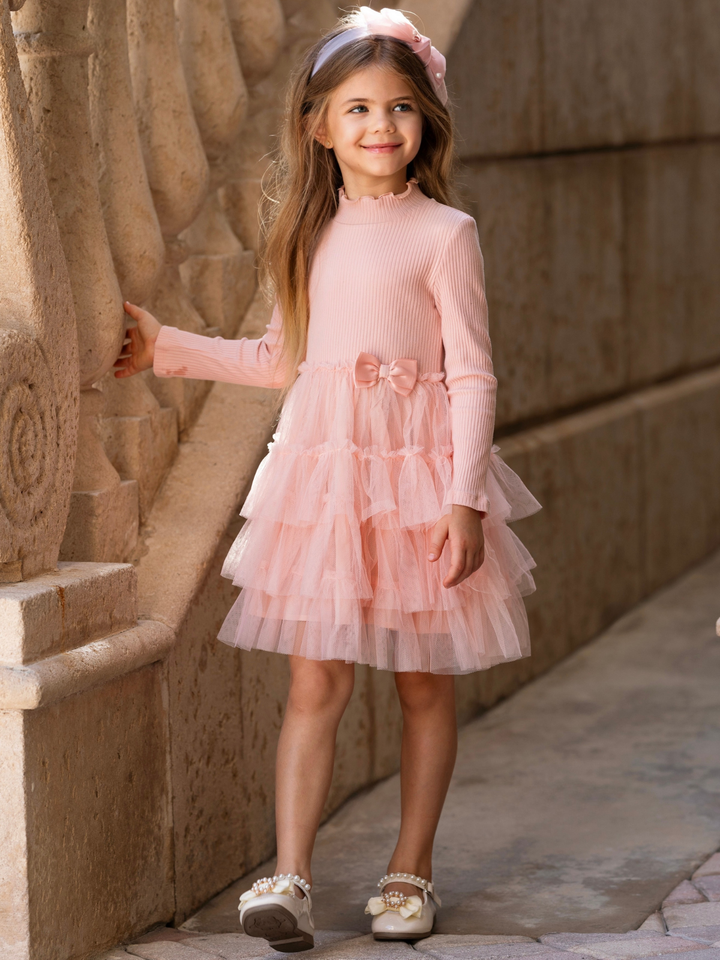Girls blush pink twirl dress with a soft ribbed bodice and tiered tulle skirt for family photos, holidays, and special occasions.