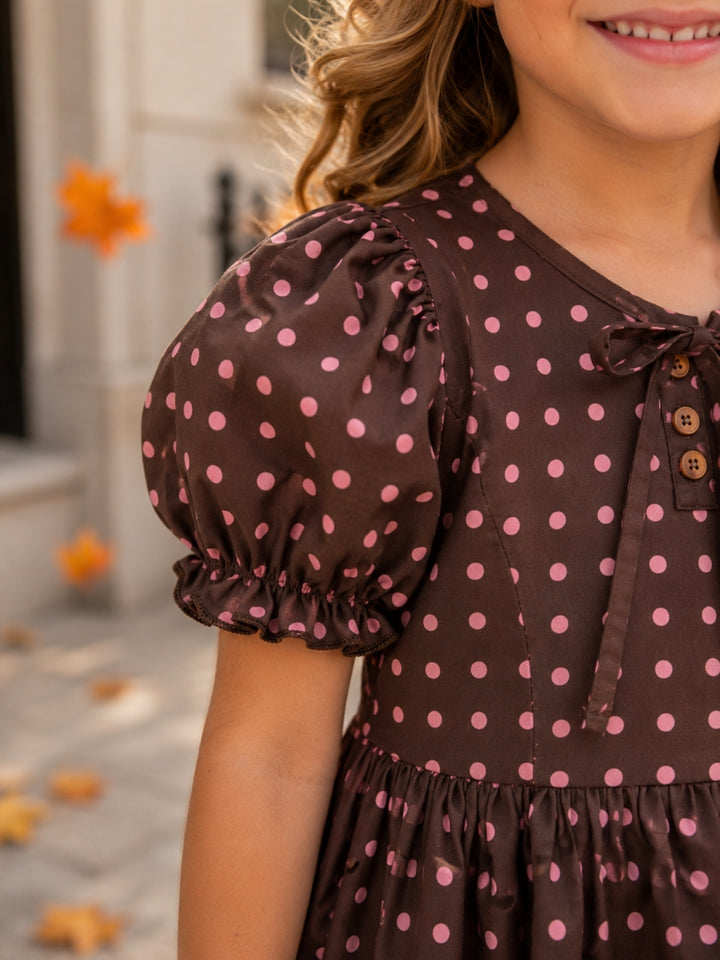 Girls puff sleeve polka dot dress for Thanksgiving.