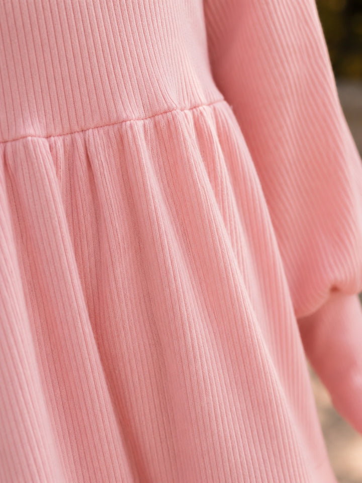 Toddler girl blush ribbed knit dress for fall family photos.