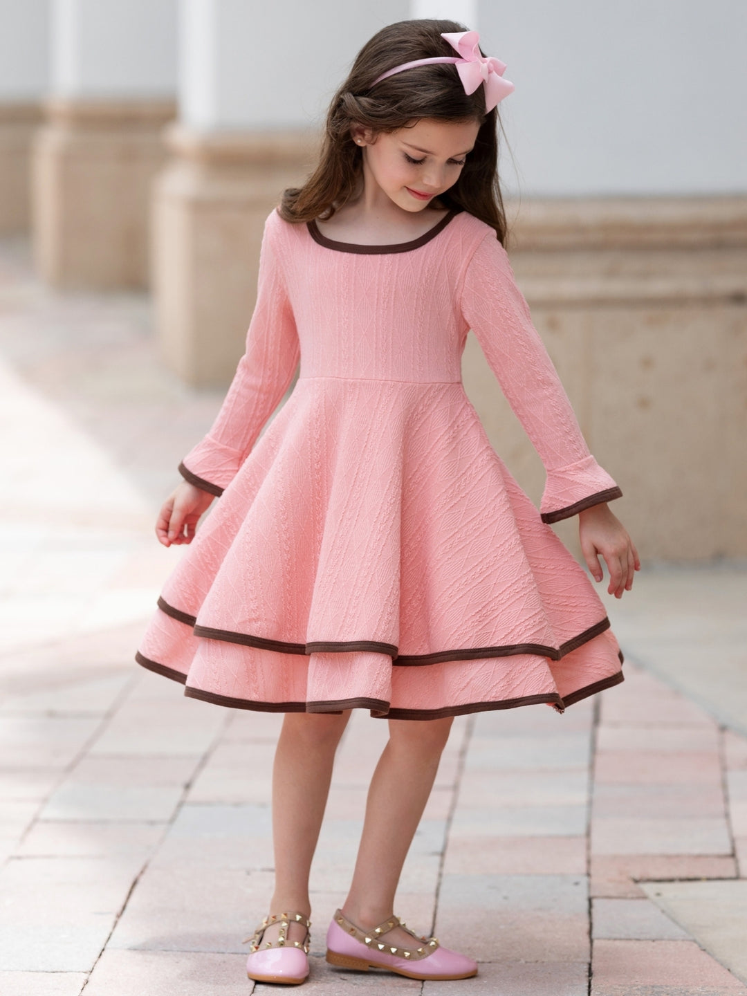 Girls fall dress with textured knit fabric.