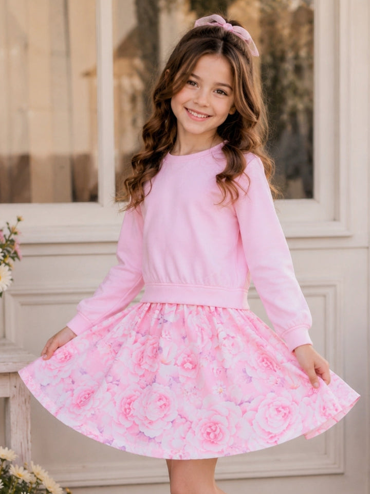 Girls floral twirl dress styled with pink Mary Jane shoes.