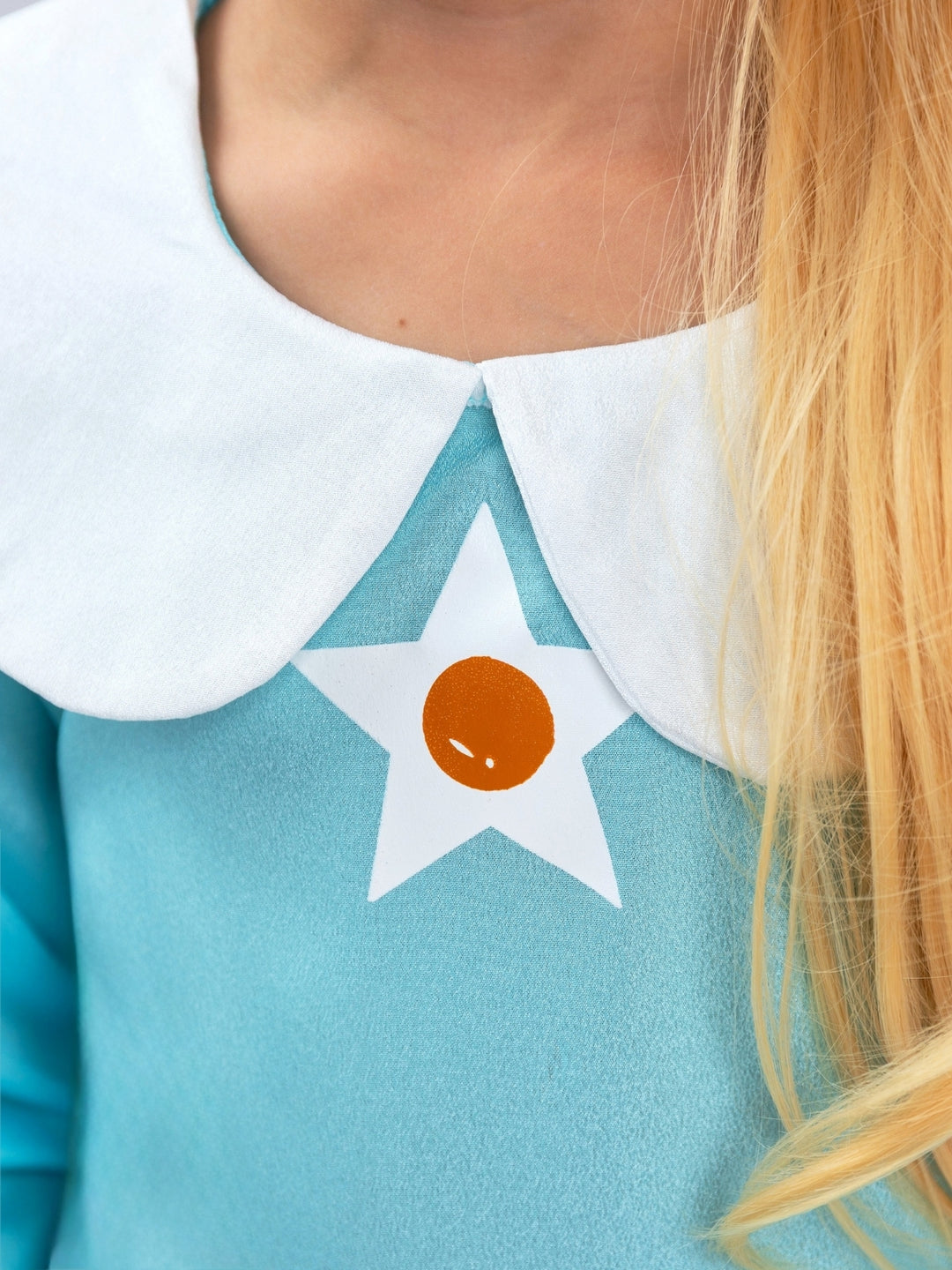Girls princess costume inspired by a beloved space adventure character.