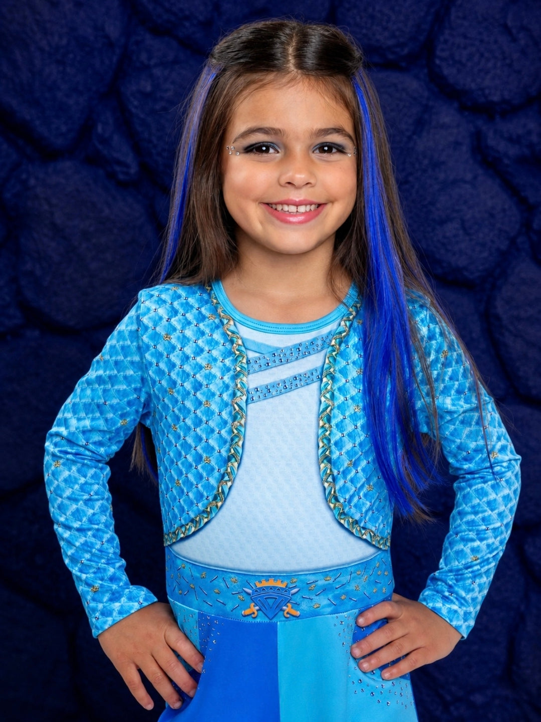 Girl wearing a blue fairy tale hero Halloween costume jumpsuit with flared legs.