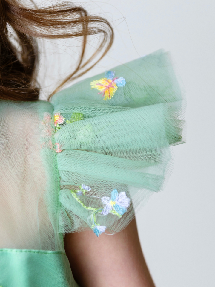 Floral embroidered tulle detail on girls sage green Easter dress