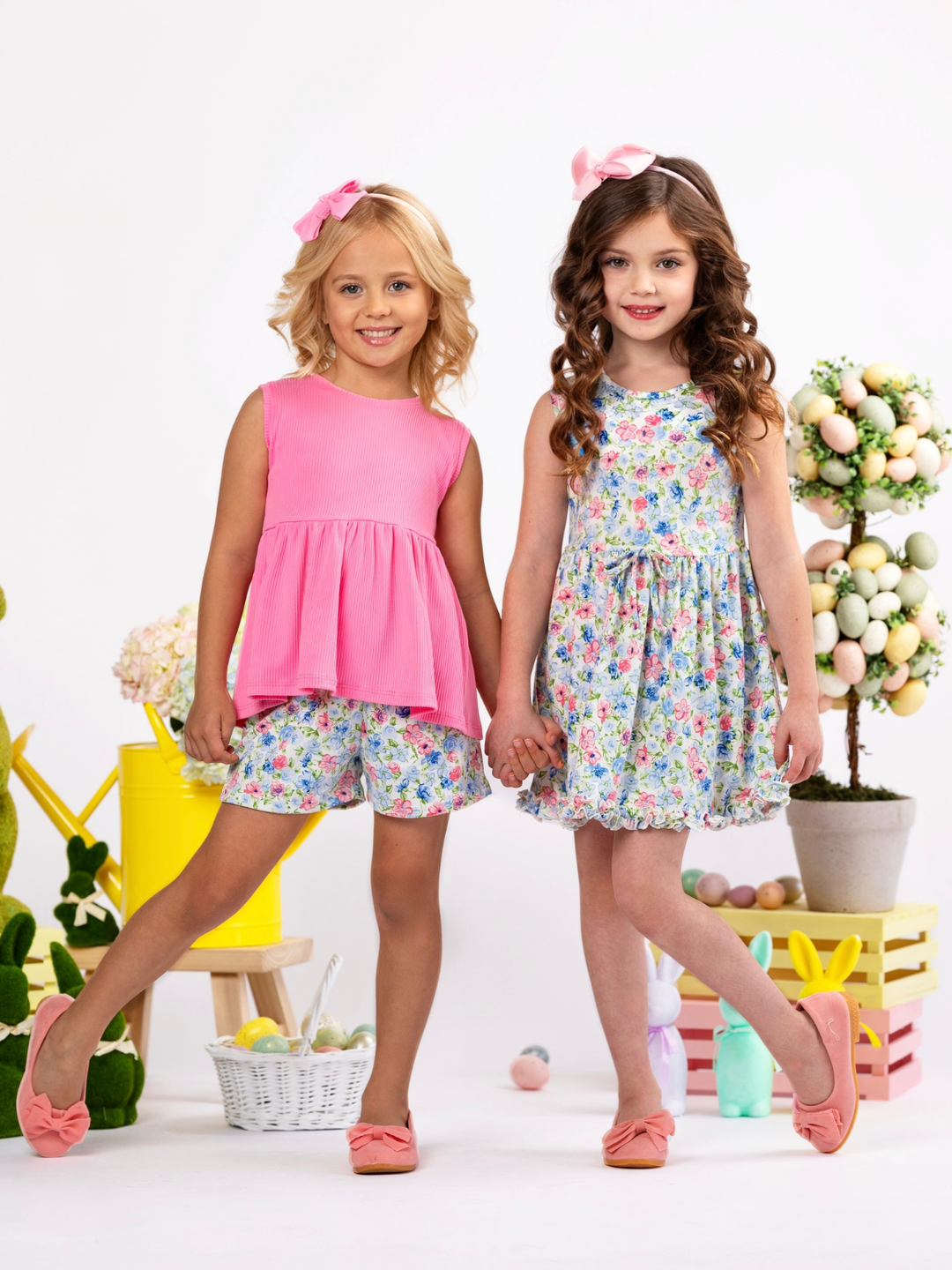 Kids pink peplum top with multicolor floral shorts set