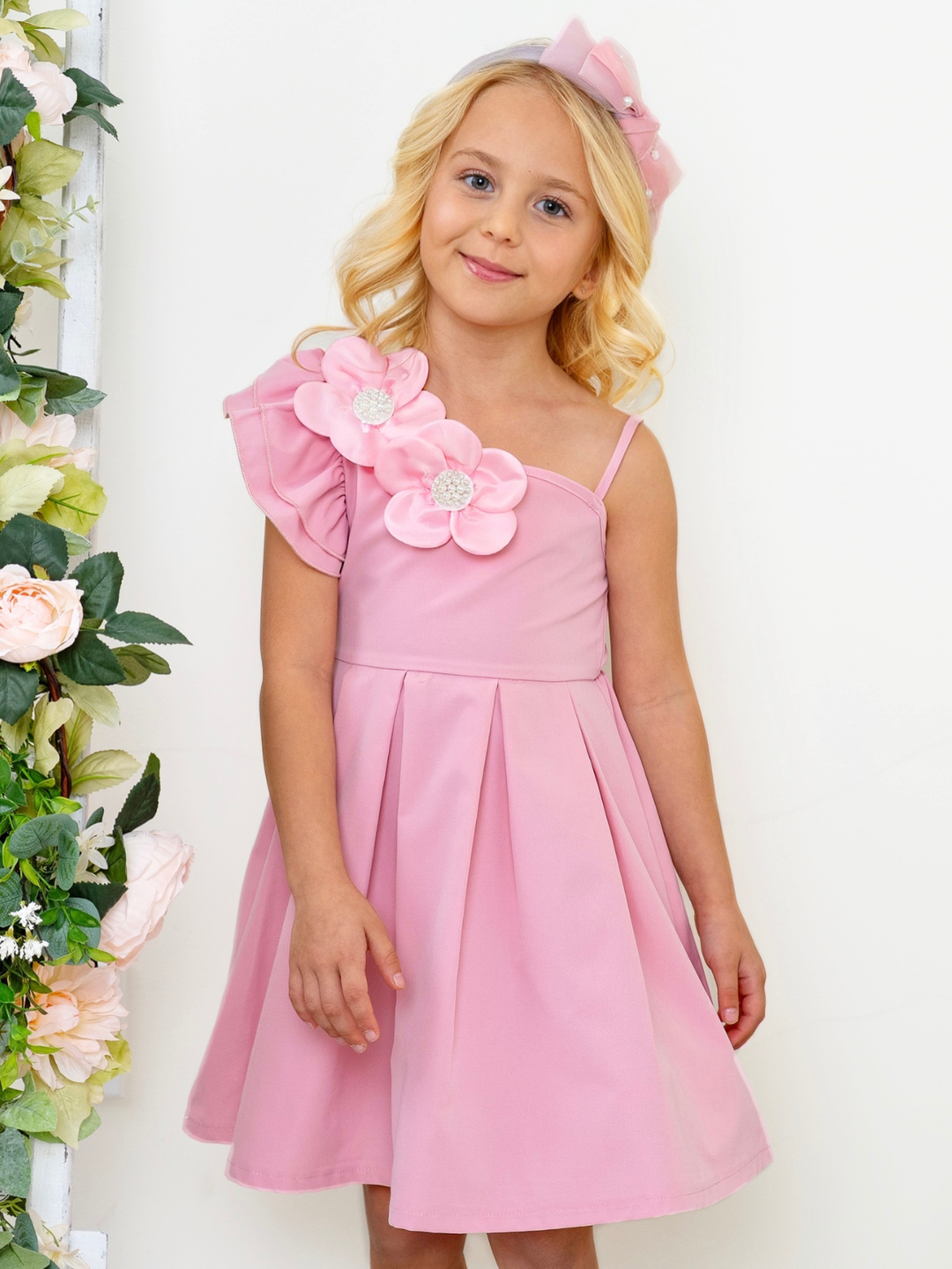 girls pink dress with pearl flower detail