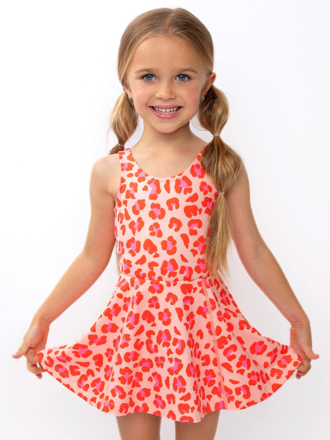 Girls athletic-inspired dress in pink animal print