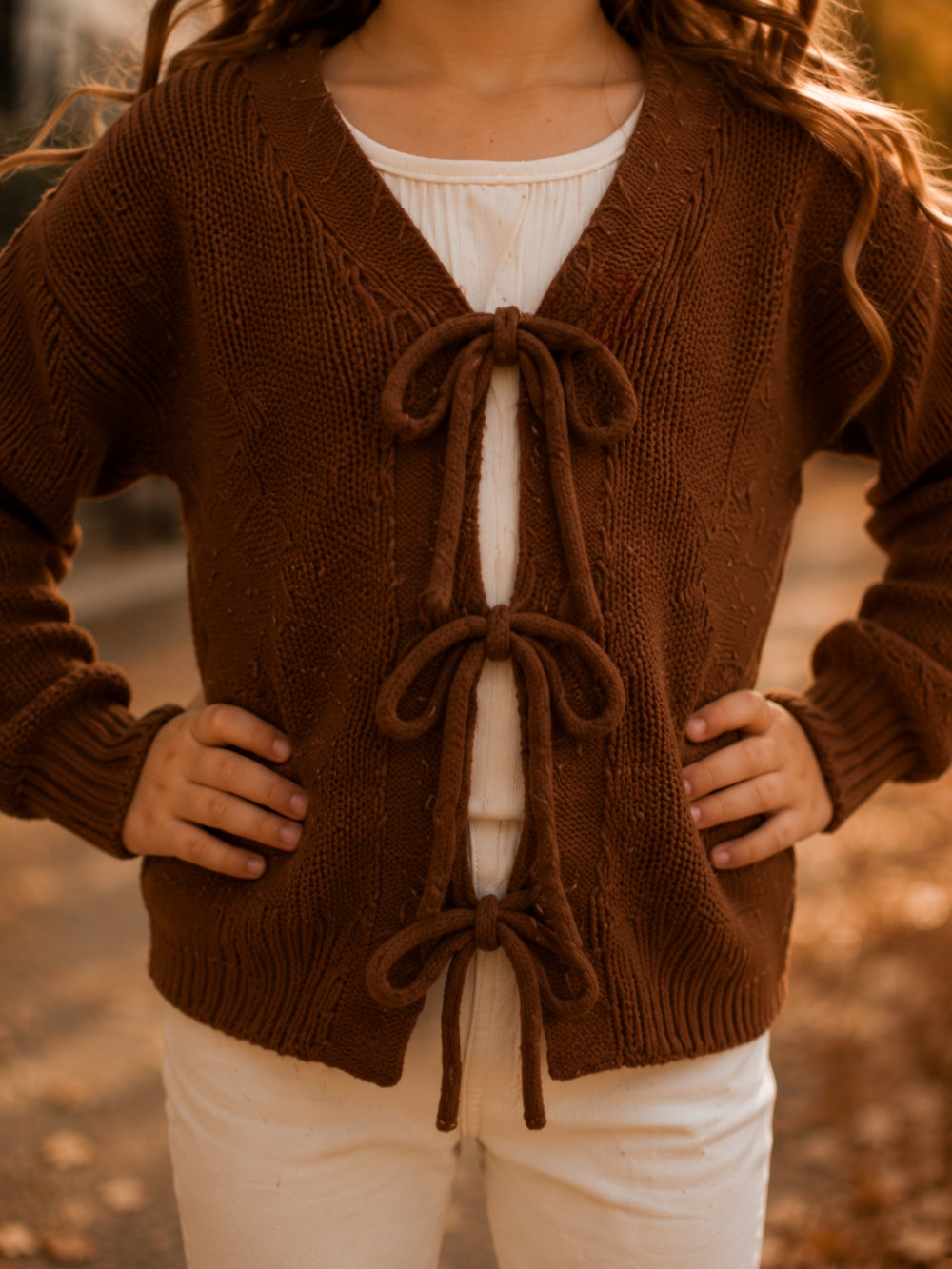 Girls brown bow front cardigan sweater.
