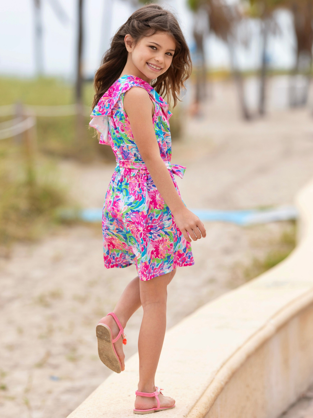 girls floral romper with ruffle neckline outfit