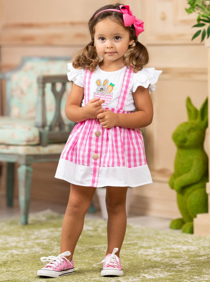 girls spring set features a white top with ruffle sleeves and bunny applique and a plaid skirt with suspenders and faux buttons and a white hem 2T to 10Y